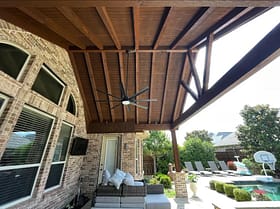 covered patio with ceiling fan built by Texas Decathlon Construction